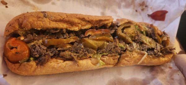 Mushroom cheesesteak with lettuce, tomato, onions and hot peppers