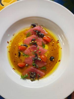 Bluefin Crudo, olive oil, garlic ponzu, olive, caper, dill, tomato, red pepper