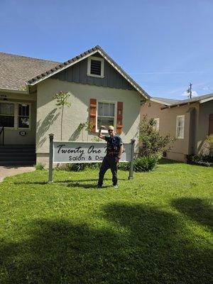 Front of the salon, along with a satisfied customer