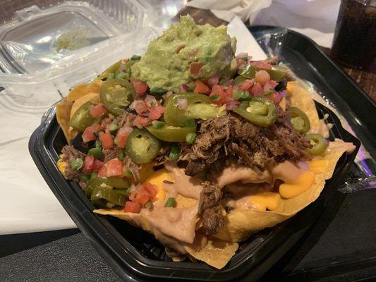 Super Nachos well prepared with cheese in the middle. All ingredients fresh also!!!