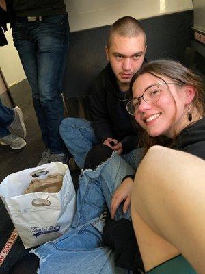 Sitting on the floor - no room even with paid SeaTac