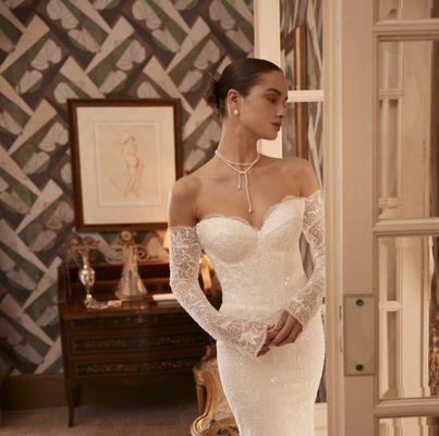 Amina gown, by Ricca Sposa. Available with beaded removable straps and removeable sleeve.