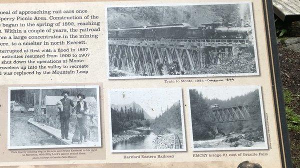 Dick Sperry with dog in his arm, and Frank Kazenski to his right in Silverton, with Billy Lord's Saloon behind them!