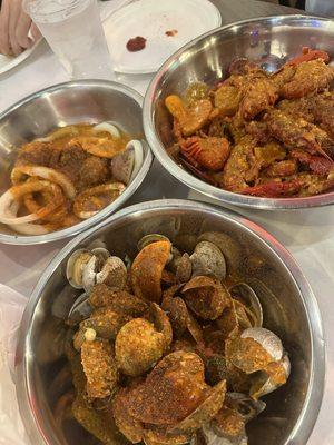 2 lb CLAMS, 2 lb LOUISIANA CRAWFISH, 1 lb Squid, all between mild-medium spice level. (Mild was very spicy)