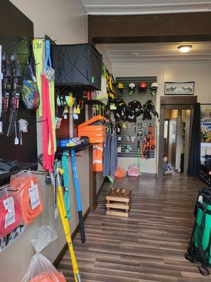 Some of the interior if the store and the gear they sell