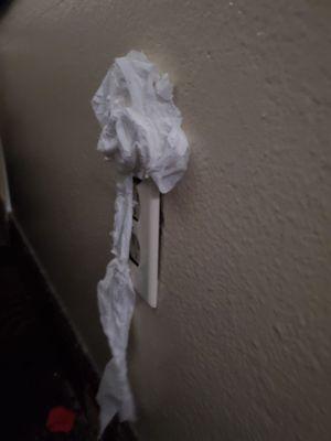 Electrical outlet wrapped in a fabric