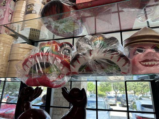 Miniature lion dancer's suits are around $75 each