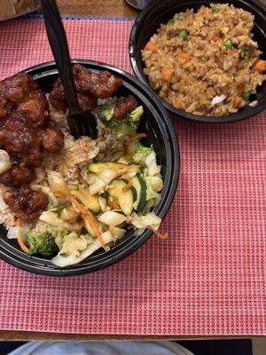 Orange Chicken Bowl and fried rice. The chicken egg roll is pretty good.