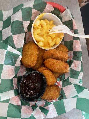 Chicken nuggets with Mac-n-cheese $1 extra.