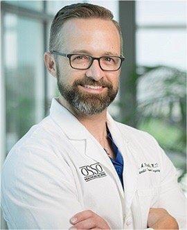 BRETT BRALY, M.D. DR. BRETT BRALY Board-Certified Orthopedic Spine Surgeon