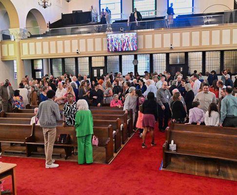 Church interior, happy and welcoming congregation