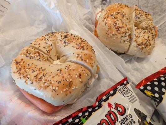 Two Sliced Nova Sandwiches on everything bagels with plain cream cheese and Zapp's Voodoo potato chips. $14.99 per. $38.12 after tax, tip.