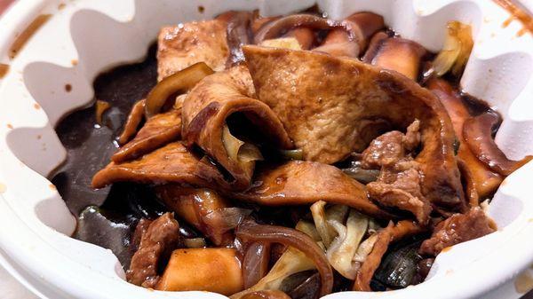 Jajang Tteokbokki 짜장 떡볶이 Korean black bean rice cake with flat fish patties, onions, a little cabbage. Not spicy. 2024.07