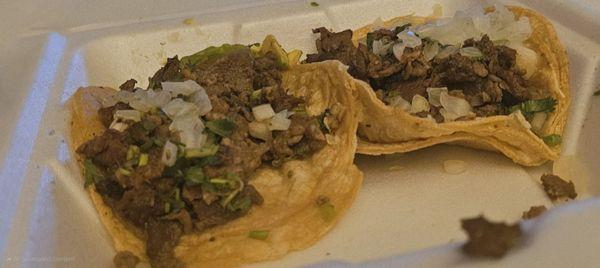 Tacos, Carne Asada with corn tortillas Tried to get this angle so you can see how much meat is in these tacos.