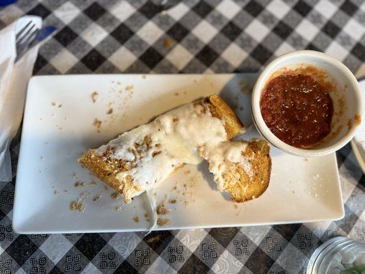 Cheesy garlic bread we already started eating before the picture.
