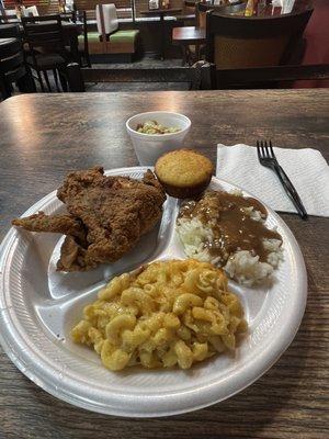 Fried chicken, baked Mac n' cheese, rice and gravy, cornbread, and Lima beans