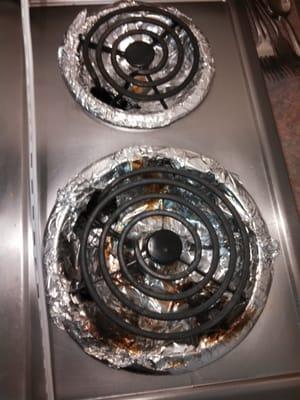 Foil on the stove top.