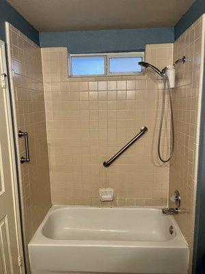 23 year old tired out unit. Mold not visible behind the tile.