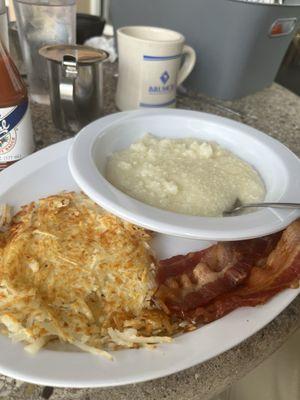 Grits, hash browns, and bacon