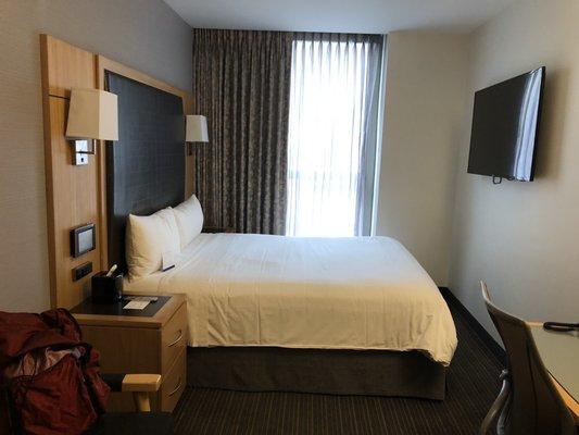 Small but comfortable queen bed