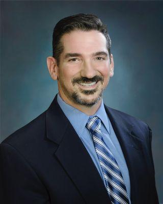 Dr. Christopher M Mule'