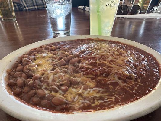 stacked (not rolled) red chile cheese enchiladas, double beans, margarita