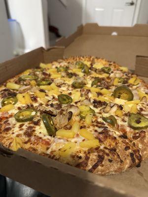 Pineapple, chicken, bacon and jalapeños.
