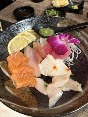 Sashimi with salmon, tuna, hamachi, mackerel and ono. Fresh grated wasabi.