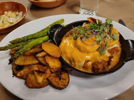 2 sole stuffed with seafood stuffing topped with giant shrimp, Newburgh sauce, roasted potatoes and asparagus. $36. Delicious!
