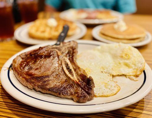 Steak & Eggs. T-bone is better quality/thicker here than Waffle House. YUM! Get it! :)...