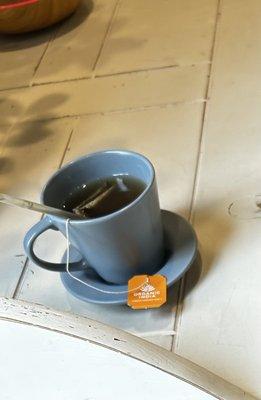 Indian Herbal Tea with a stick of honey