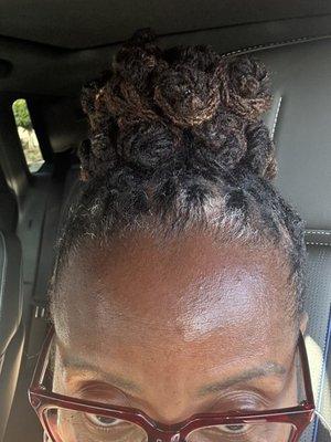 Words can't express the magic hands that Nathan has. My loc retwist and style came out so amazing. Trust me, you won't be disappointed.