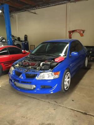 Evo 8 in for Tomei Stage II Cams, bigger injectors, timing belt service, BC Titanium Valve Springs and Retainers, gauge install & fuel pump.