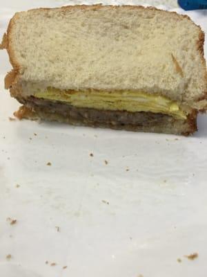 Sausage egg on white. Doesn't even need condiments.