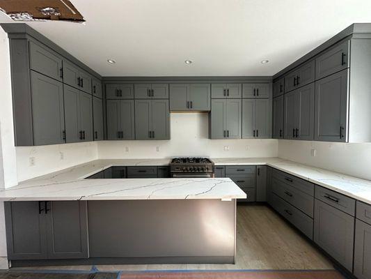 Sleek grey cabinets with clean lines and quality craftsmanship by GLC Cabinet.