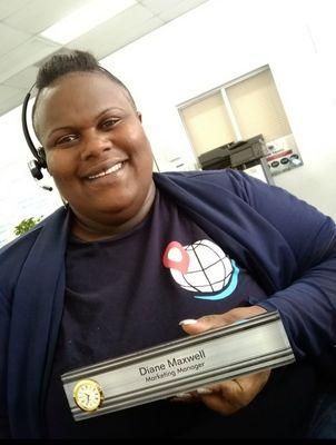 Team member Diane Maxwell at Tax Legend Services, photographed in the office wearing branded company apparel