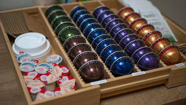 Enjoy a Nespresso coffee or espresso in our cozy waiting room. Dairy free creamer, anyone?