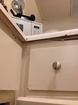 Kitchen area screws sticking out and painted over