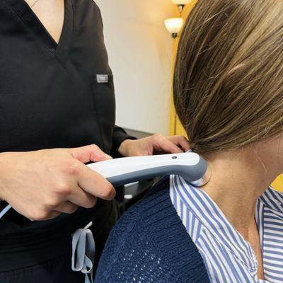 Therapeutic ultrasound for neck pain and tightness from sitting at a desk and looking at a computer
