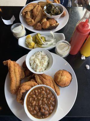 Catfish fillets with baked beans and coleslaw.