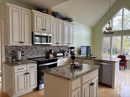Sparkling clean kitchen with gleaming surfaces and a spotless finish.