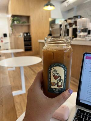 Their coffee in a glass jar