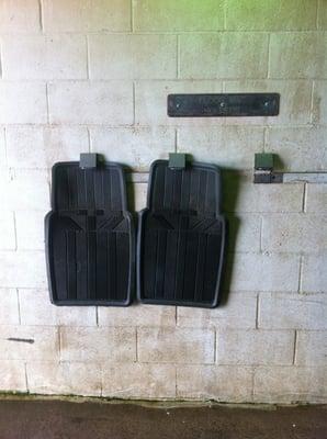 Floor mat holders