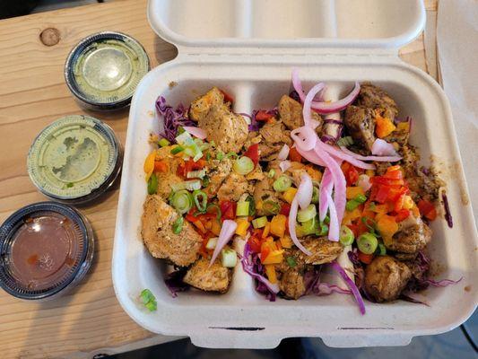 2 chicken and 1 salmon kabobs with bmoomi and mirchup sauces, delicious