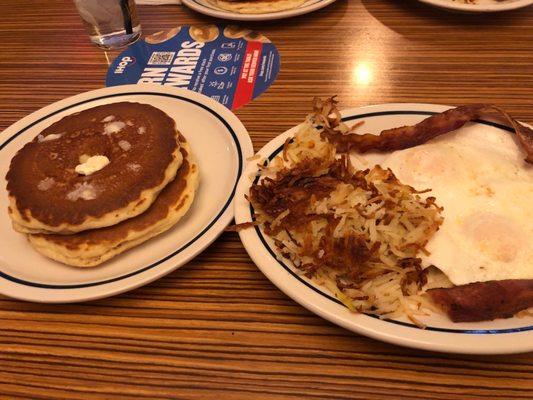 Pancakes, eggs, toast, bacon and Hashbrowns