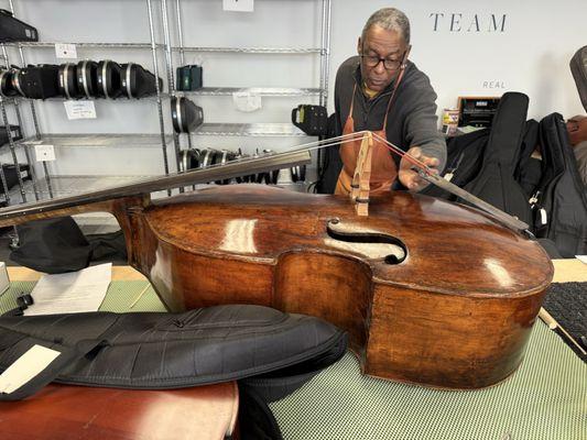 Atelier luthier working on a 1700's vintage bass from Turin Italy!
