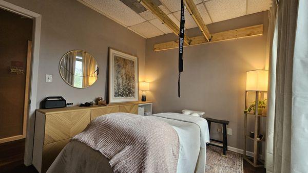 The serene and cozy treatment room for Hand & Sole Massage.