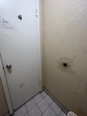 Kicked in door and broken wall