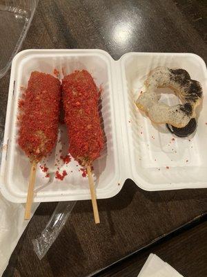Hot Cheetos dog and Oreo Mochinut from same counter inside restaurant