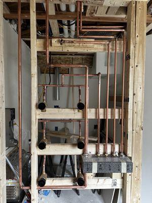 Rough in for a steam shower with 10 body sprays and 2 shower heads